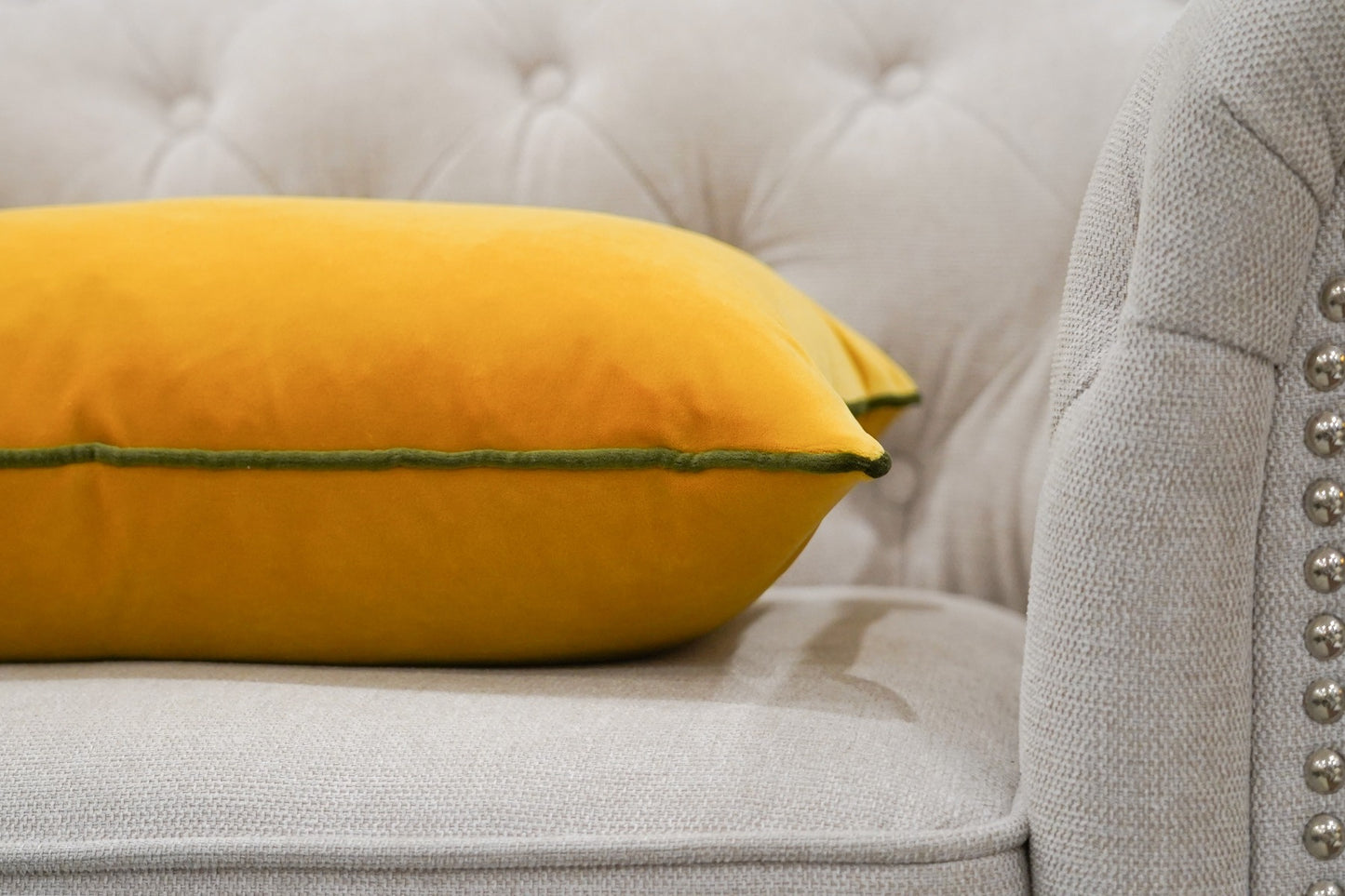 Saffron Cushion with Green Piping